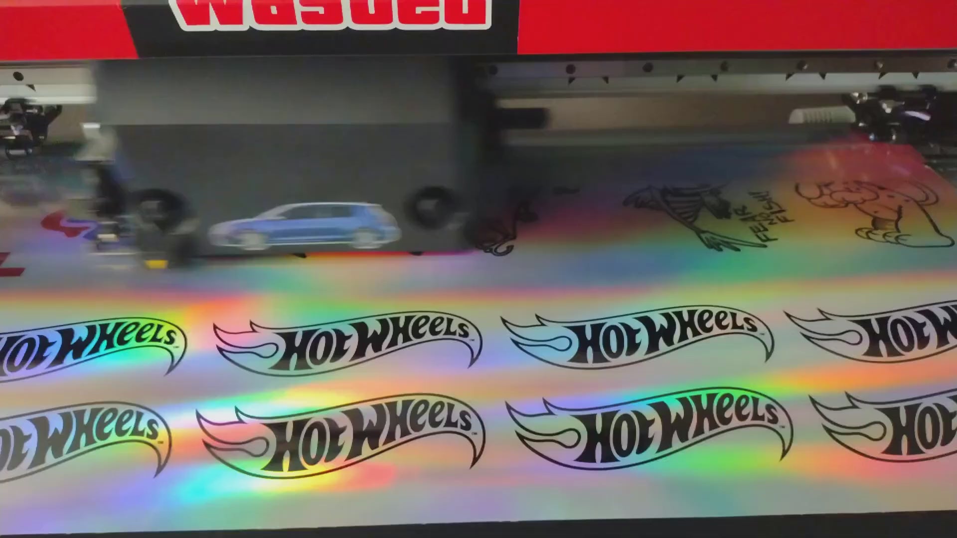 Load video: Wide Format Printing at Unique Graphix